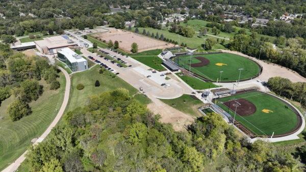 An aerial view of a green field